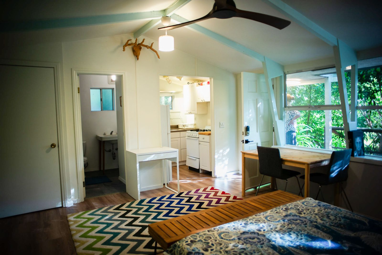 View from bedroom toward bathroom and kitchen